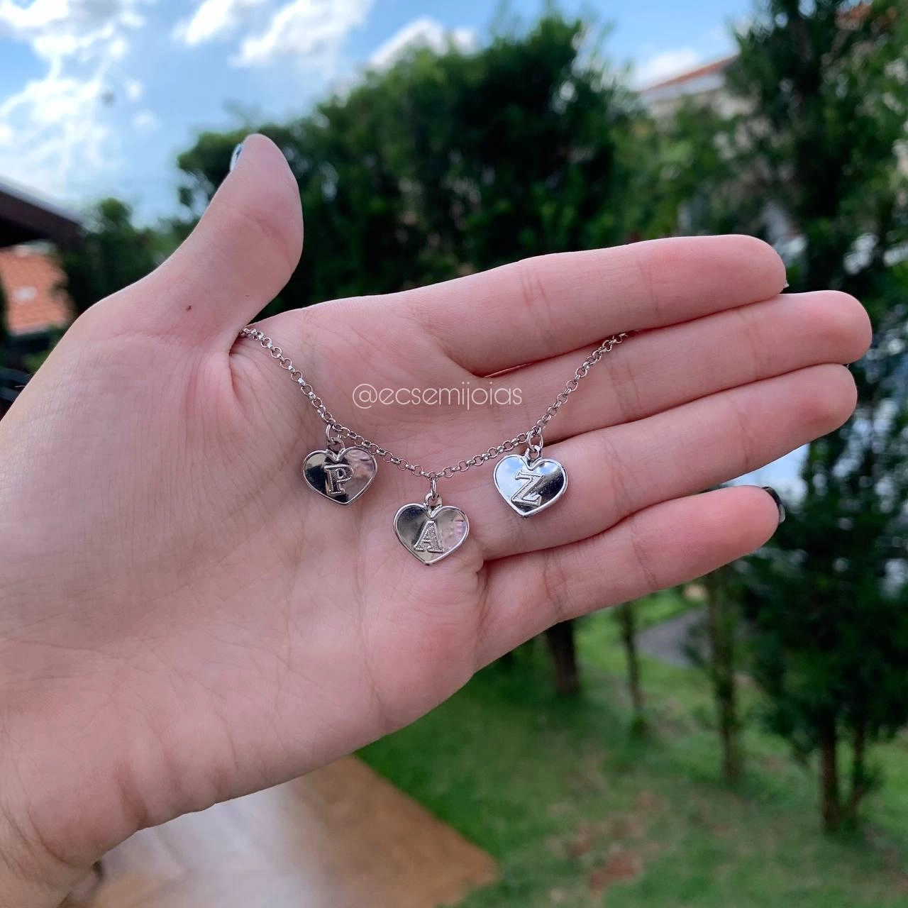 Pulseira coração escrito Paz- banhado a ródio branco