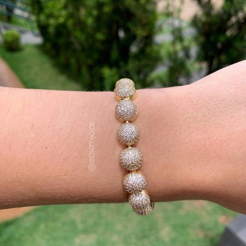 Pulseira bolas cravejadas dourada