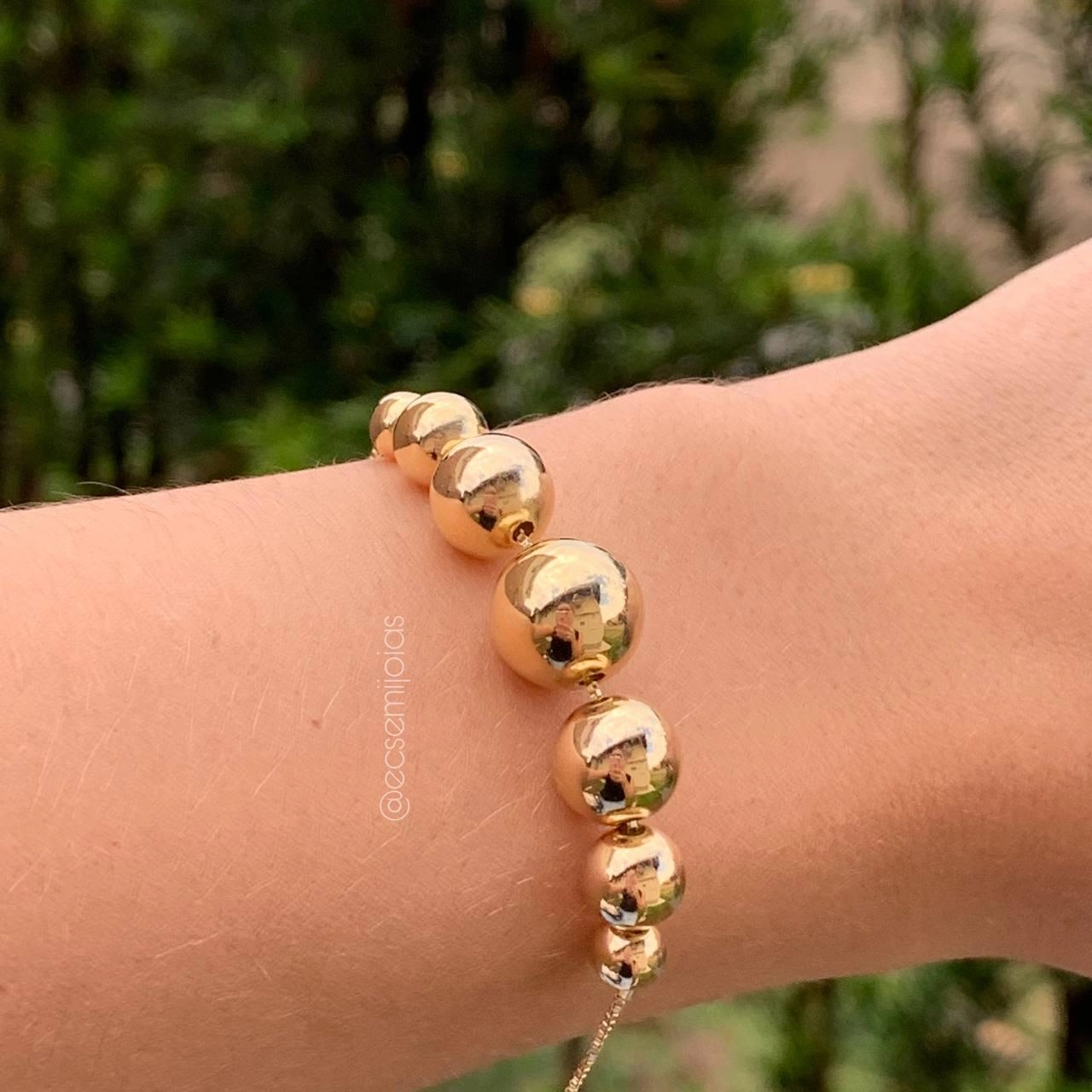 Pulseira shambala bolas lisas (central maior e diminui) 7 bolas
