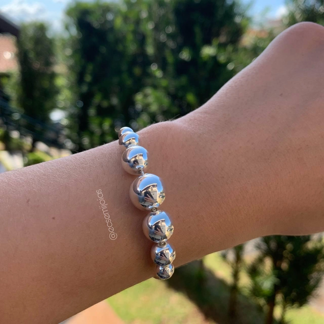 Pulseira shambala bolas lisas (central maior e diminui)