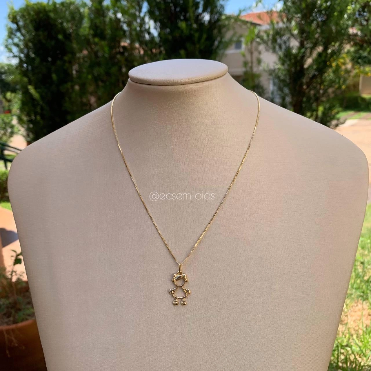 Colar de menina com laço no cabelo - banhado a ouro 18k