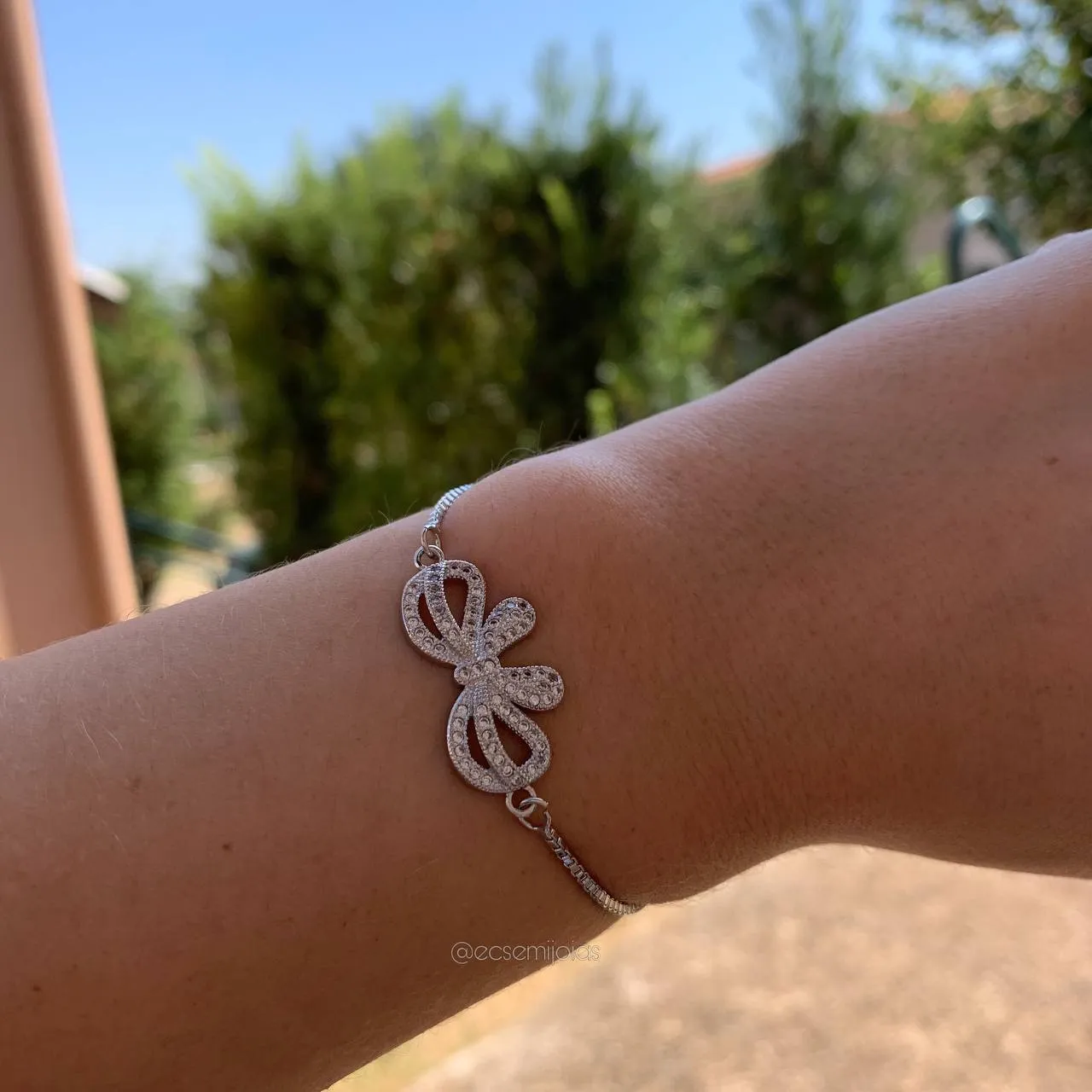 Pulseira shambala de laço cravejada - banhado a ródio branco