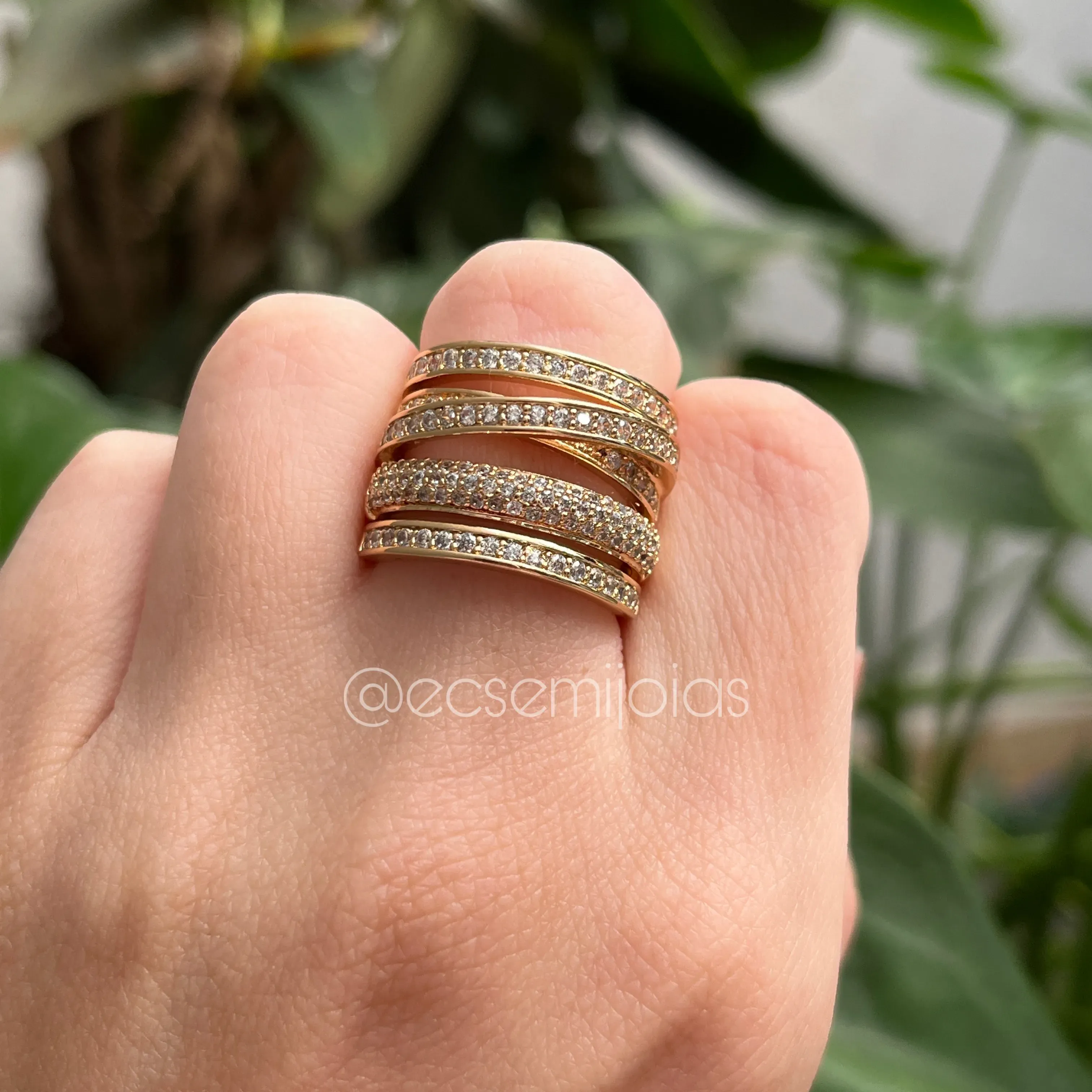 Anel entrelaçado vazado todo cravejado - banhado a ouro 18k