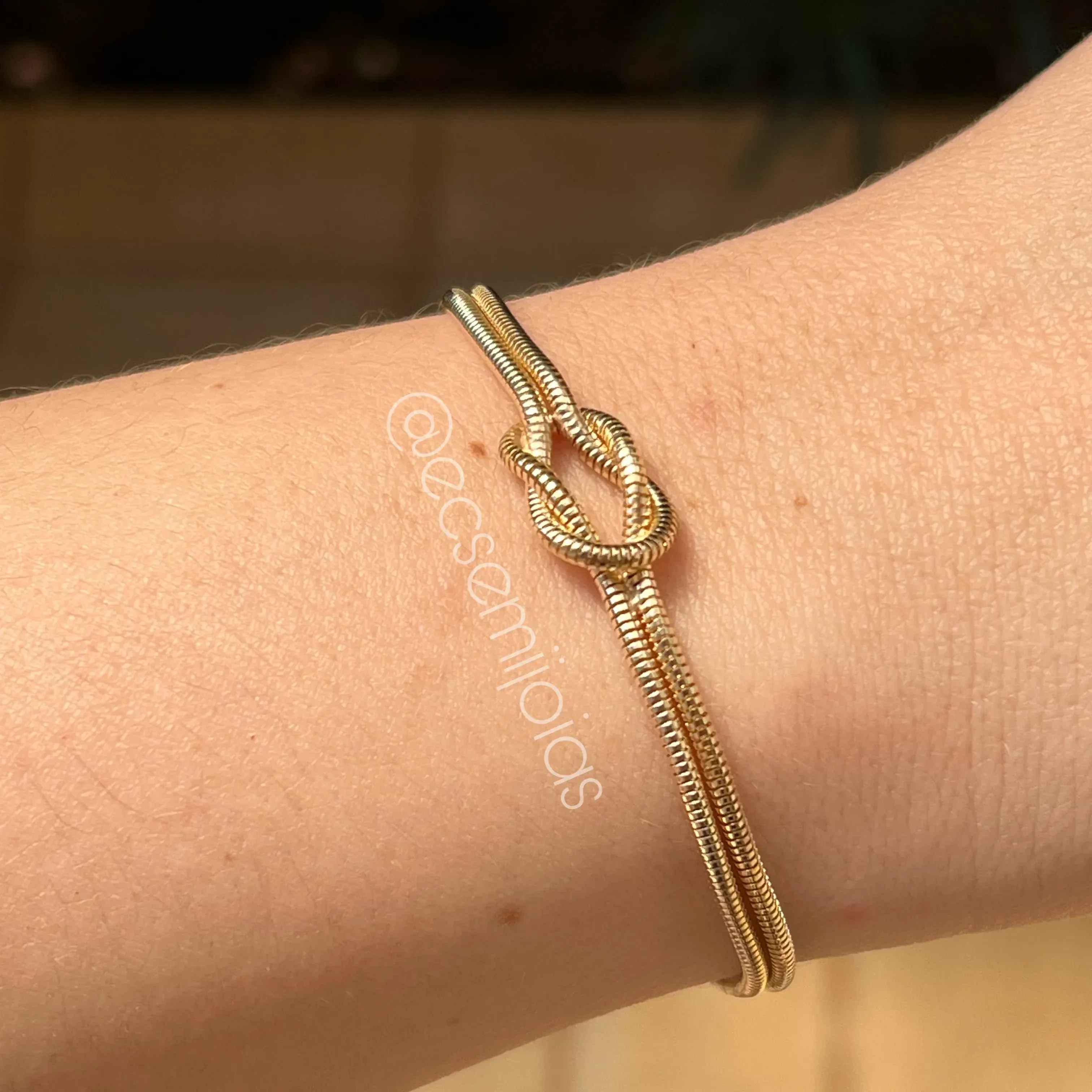 Pulseira elo rabo de rato com nó no centro - 18 cm - banhado a ouro 18k