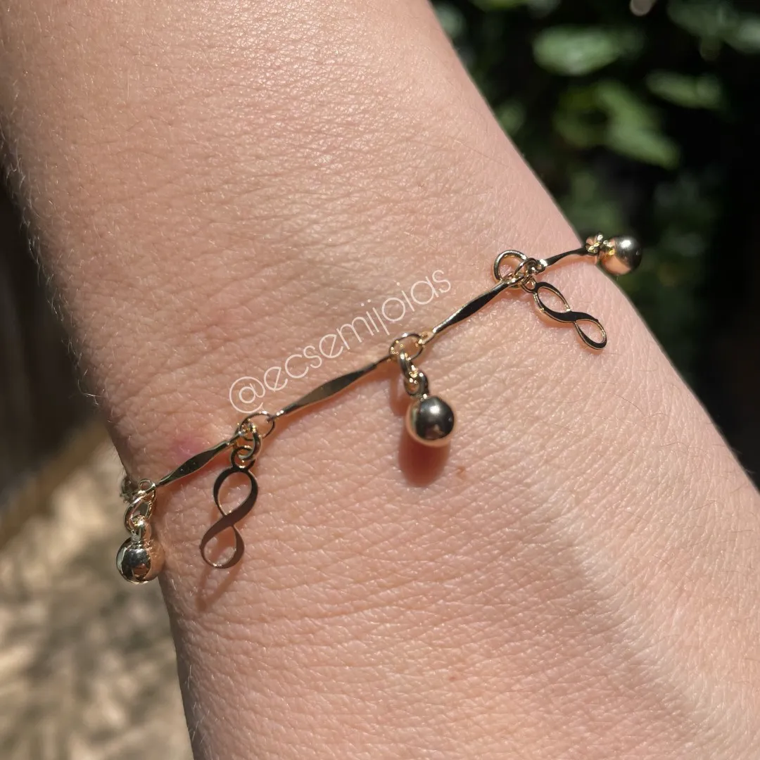 Pulseira com bolas lisas e infinitos pendurados  - 19cm + extensor - banhado a ouro 18k