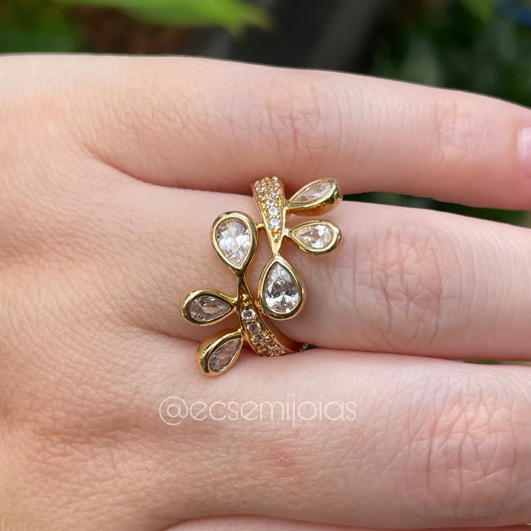 Anel com folhas de zircônias gotas com aro cravejado  - banhado a ouro 18k