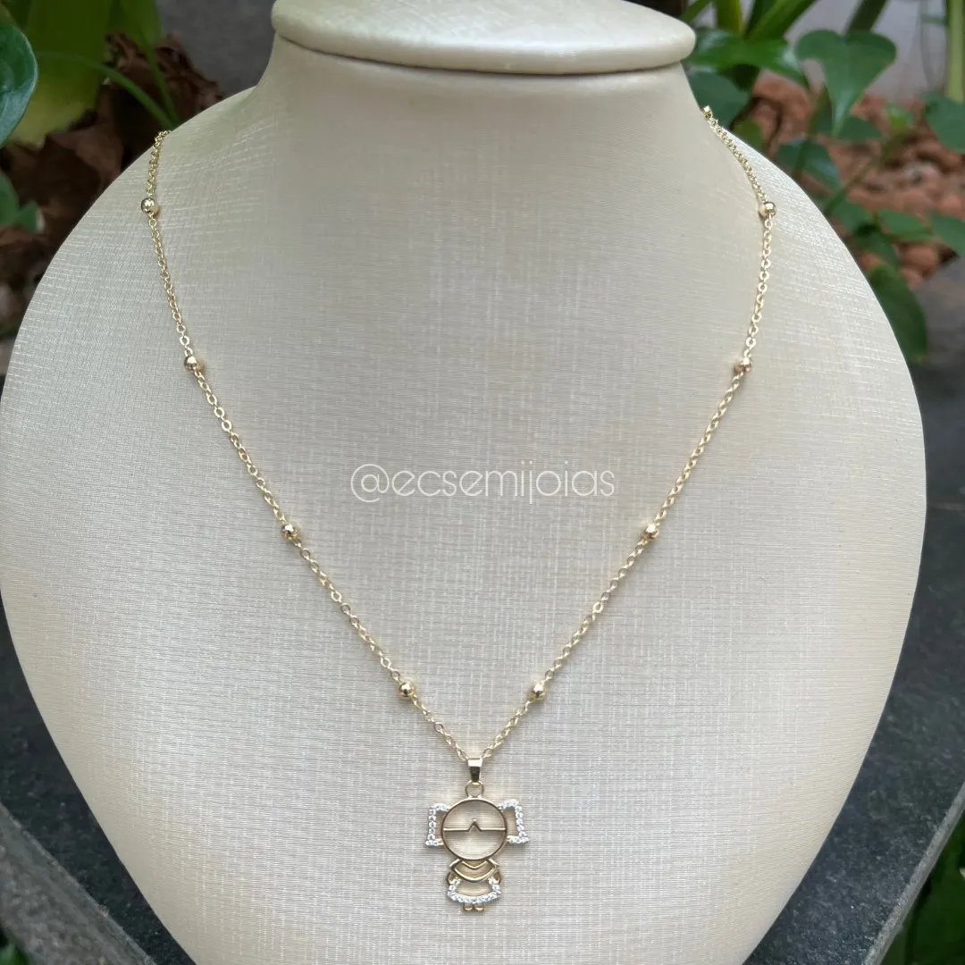 Colar de bolinhas com pingente de menina vazada cravejada - banhado a ouro 18k