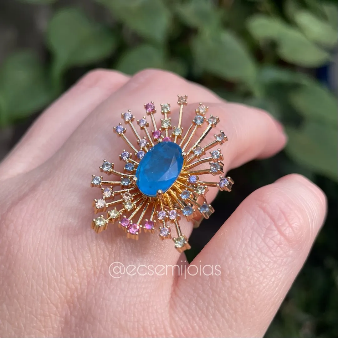 Conjunto anel e brinco com pedra oval fusion no centro com aros vazados em volta com zircônias nas pontas - banhado a ouro 18k