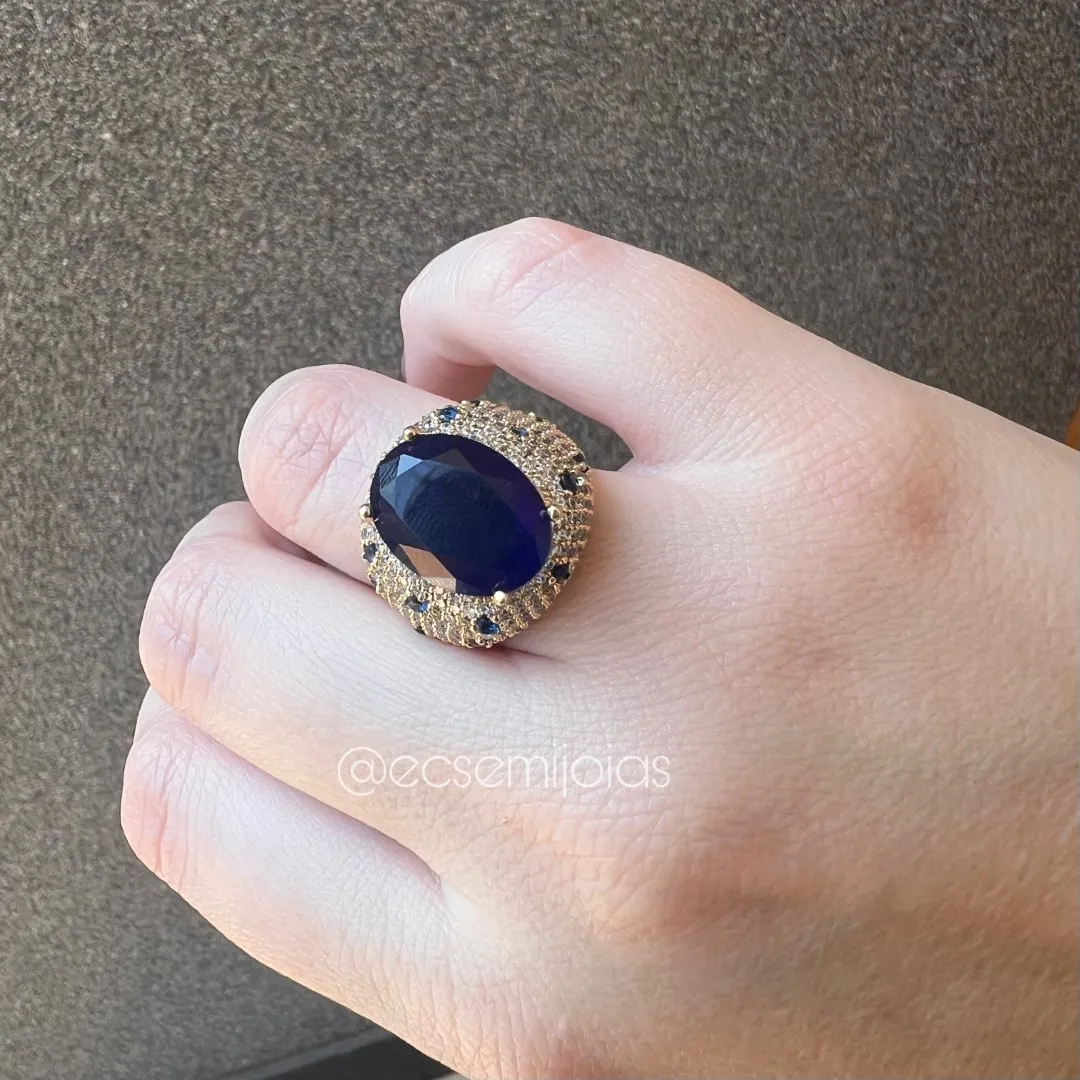 Conjunto de anel e brinco com pedra oval grande no centro cravejado em volta - banhado a ouro 18k
