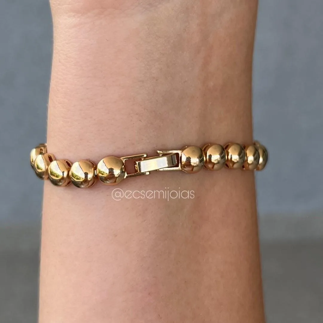 Pulseira com fileira de meias bolas cravejadas e lisas no final - banhado a ouro 18k