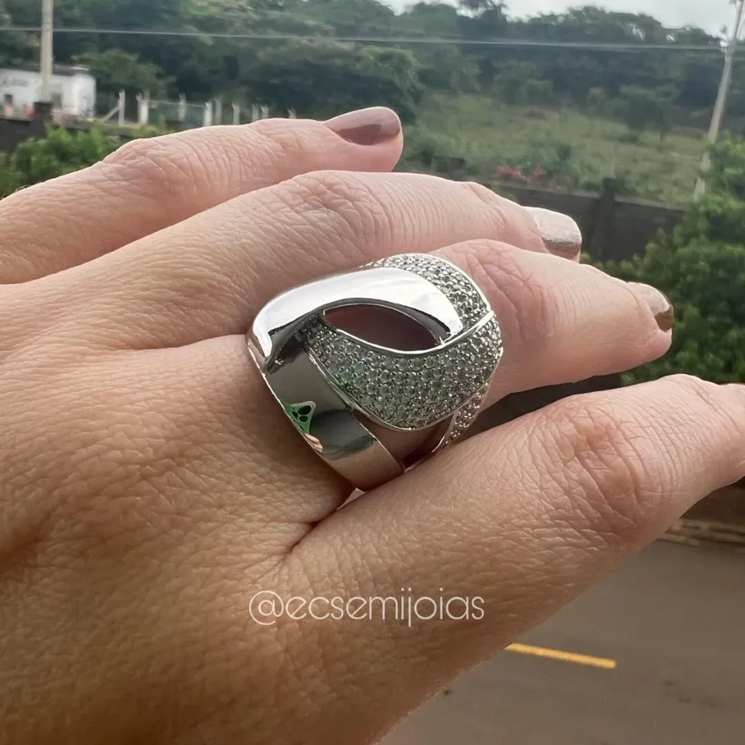Anel entrelaçado com aro cravejado e outro liso polido - banhado a ródio branco
