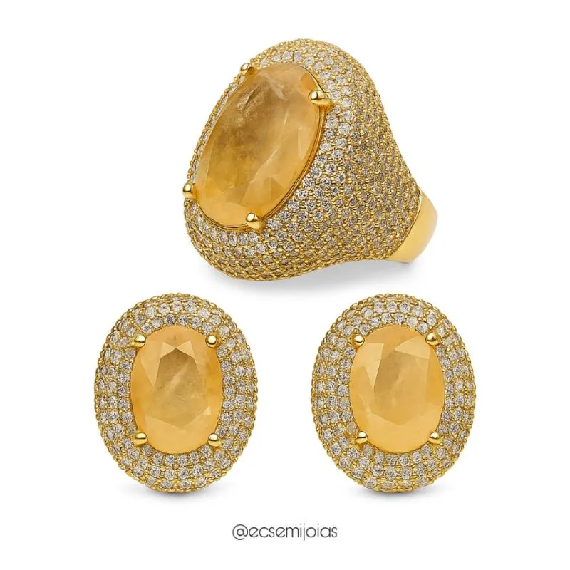 Conjunto de anel e brinco com pedra oval grande no centro cravejado em volta e laterais - banhado a ouro 18k