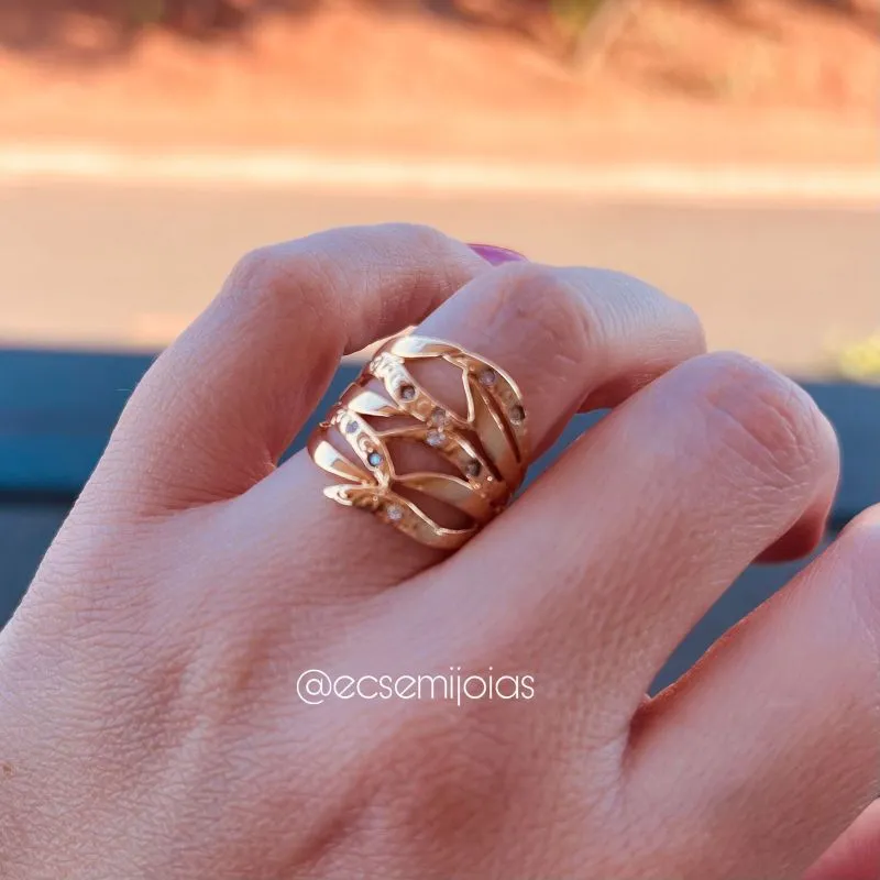 Anel de aros entrelaçados lisos e cravejados - banhado a ouro 18k