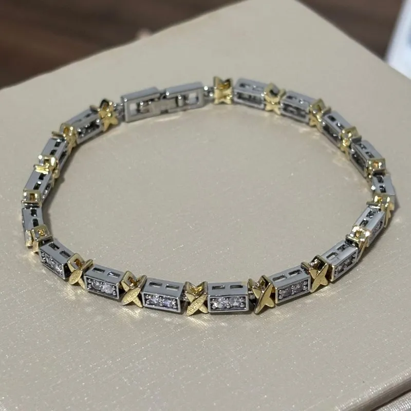 Pulseira com X intercalado com zircônias - banhado a ródio branco